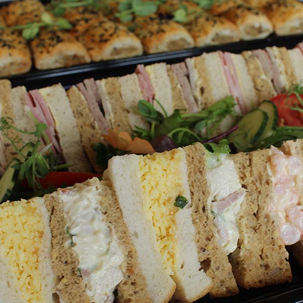 Buffet Sandwiches Lady watching a movie in Hydro Hotel Lounge