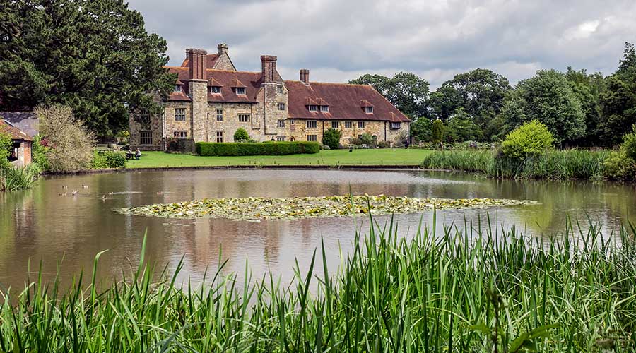 Exterior View across the lake of Michelham Priory Exterior View across the lake of Michelham Priory