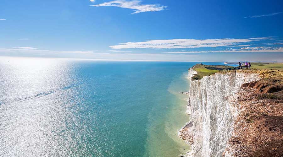 Beachy Head with chalk cliffs near the Eastbourne, East Sussex, Walkers on Beachyhead, East Sussex